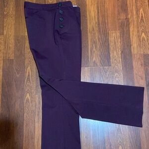 Beautiful Columnist Brand pant from Express. Black buttons Pockets back are seam